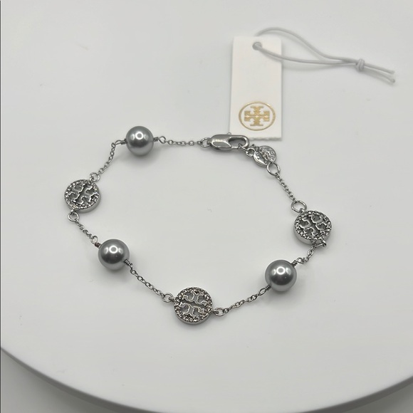 55. Tory Burch Silver Logo Bracelet - Picture 1 of 2